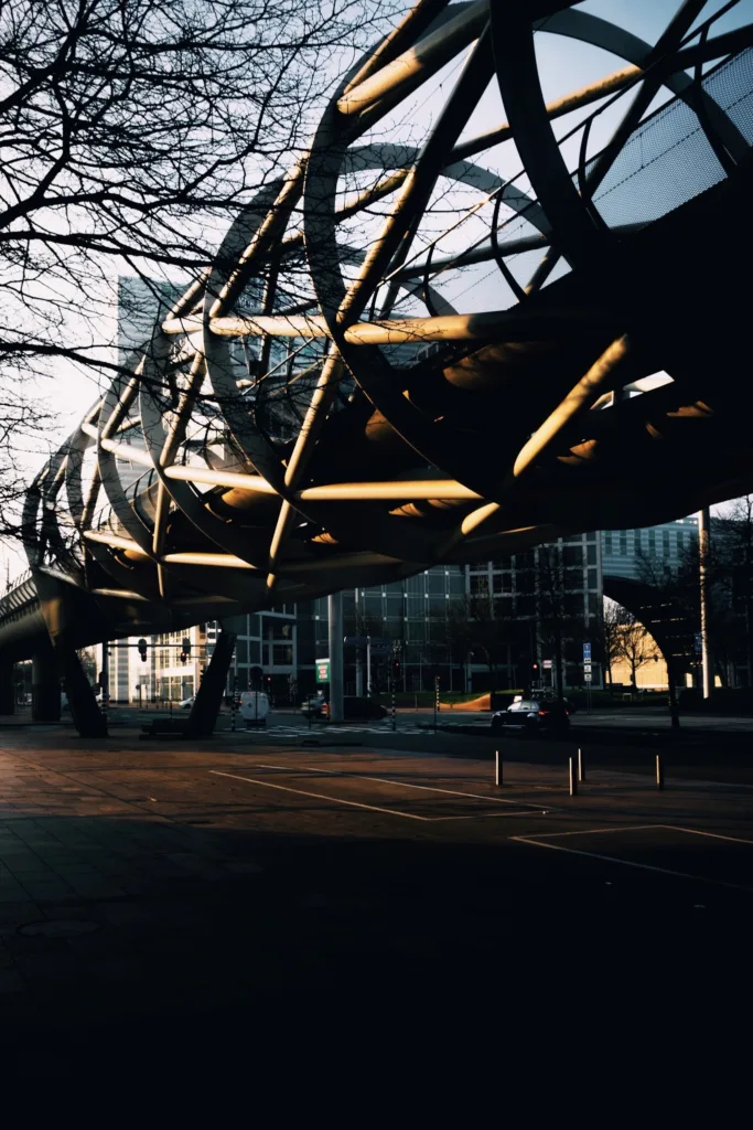 Steel and glass roof structure of a hall, backlit